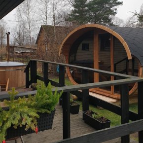 oval sauna med vildmarksbad deluxe i have