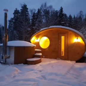 oval sauna med vildmarksbad deluxe i sne
